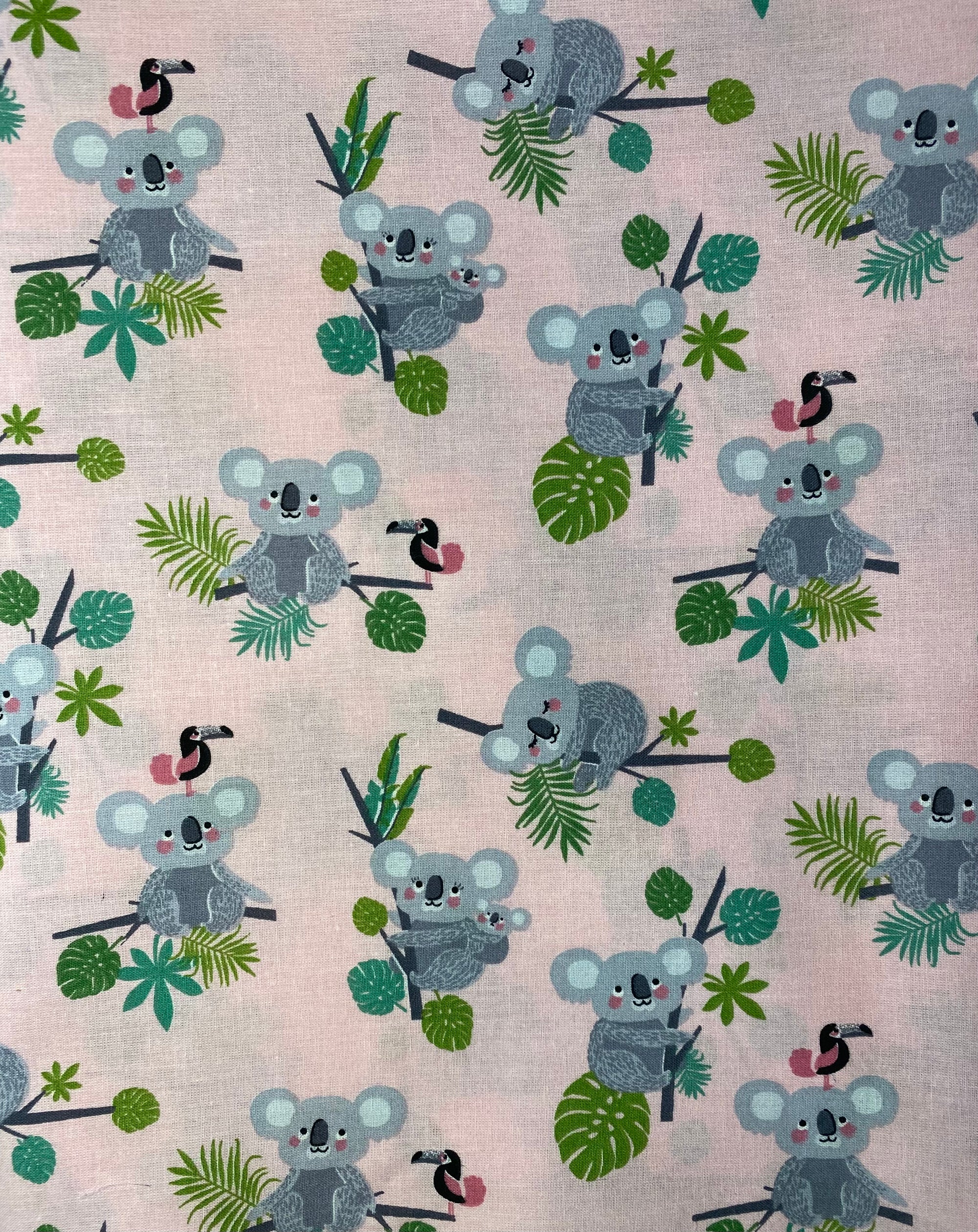 Tela popelín algodón 100% estampado Koalas fondo rosa